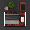 Black Widow 'Unleash the Power' Desk Mat with gothic spider design and fiery red-orange accents on neoprene surface