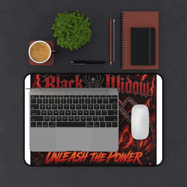 Black Widow 'Unleash the Power' Desk Mat with gothic spider design and fiery red-orange accents on neoprene surface