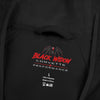 Black Widow Mardi Gras black lightweight windbreaker with "March Goes Insanity" graphic and pale camo shell