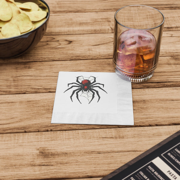 Black Widow Spider cocktail napkin with embossed edges and vivid red abdomen design on white three-ply paper