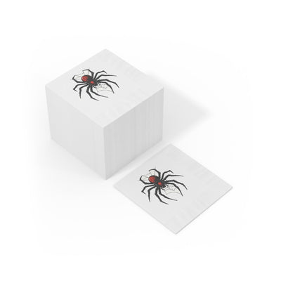 Black Widow Spider cocktail napkin with red abdomen and embossed edges for Halloween parties