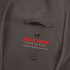 Black Widow Mardi Gras blackout windbreaker with "March Goes Insanity" graphic and pale camo design